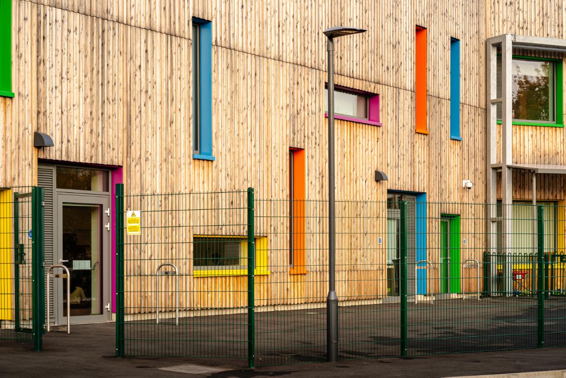 Ysgol Gymraeg Y Trallwng school exterior at dusk