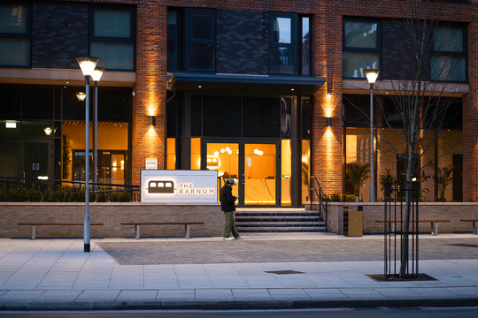 Warm exterior lighting creating a welcoming nighttime environment