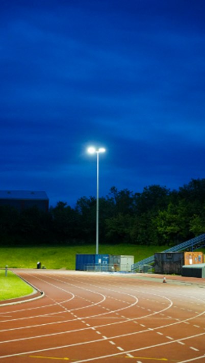 Milton Keynes Running Track at Night Illuminated by AMNIS Flood lights by Kingfisher Lighting