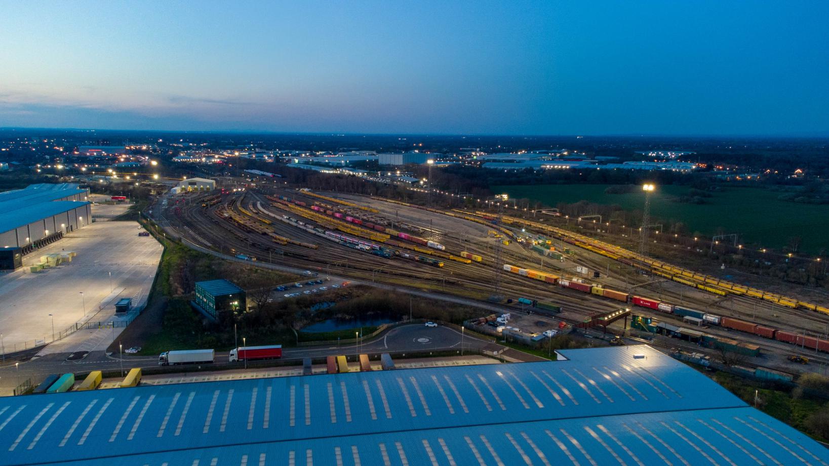 Industrial LED floodlighting installation illuminating a large exterior site