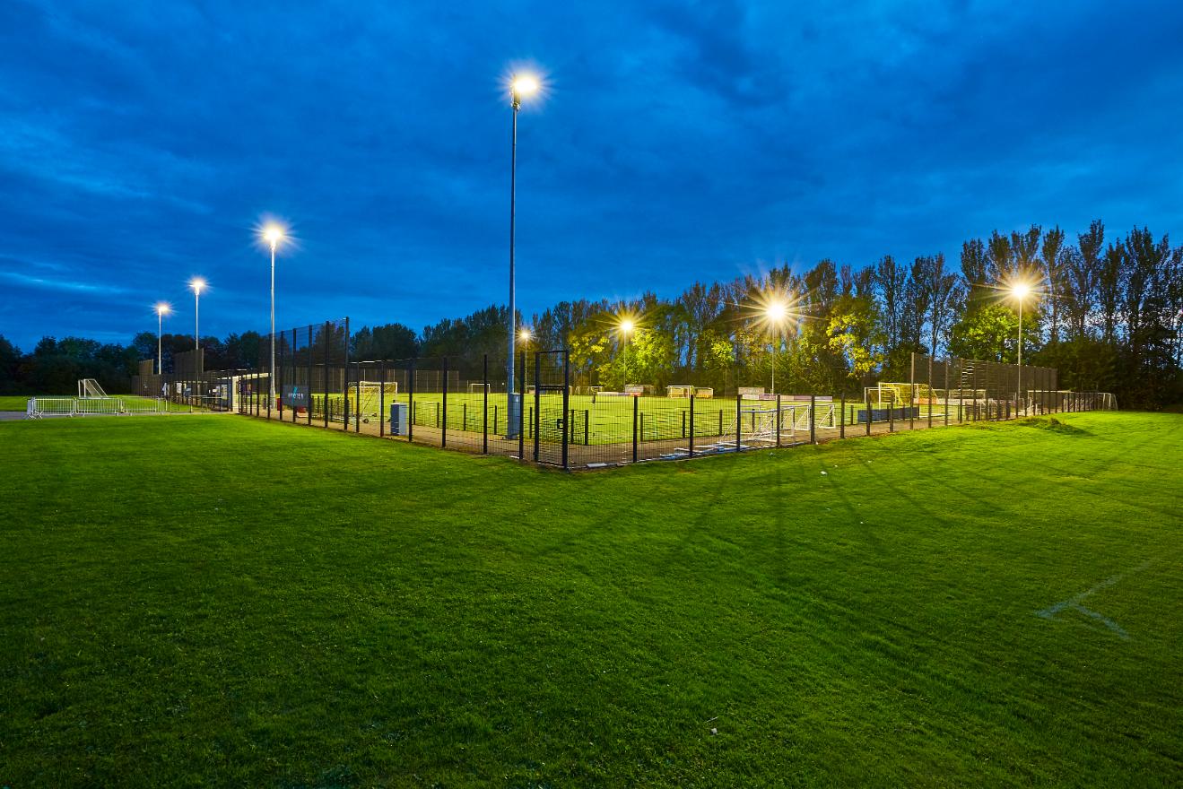 LED floodlighting illuminating a sports pitch at night